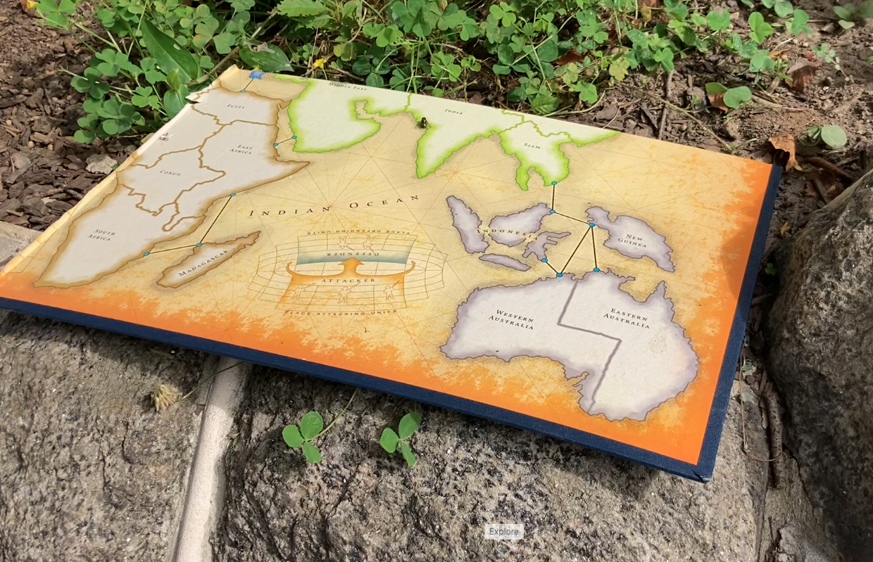 Board game showing parts of Asia/Micronesia/Australia