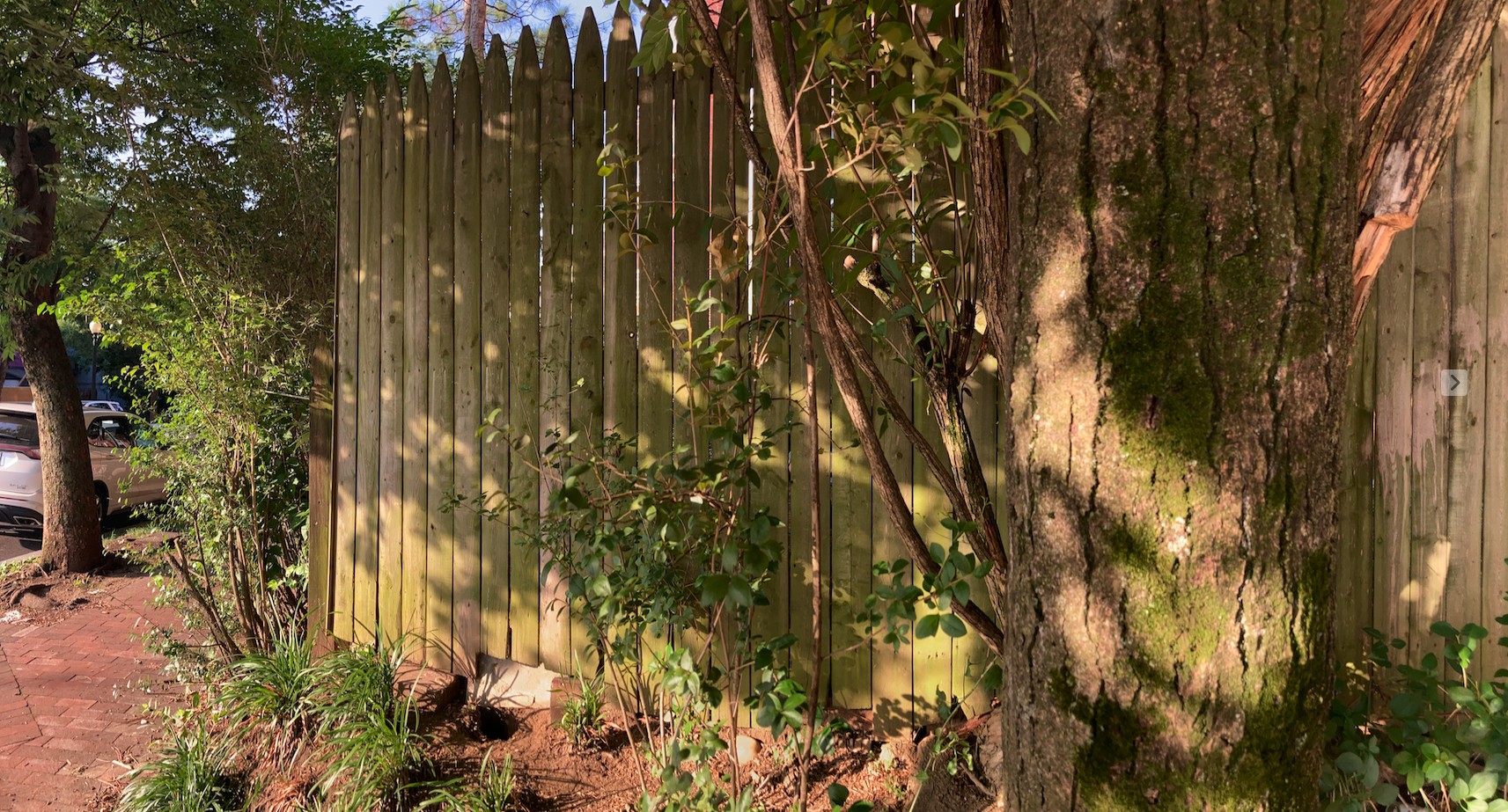 Fence with red dirt - on Ingleside