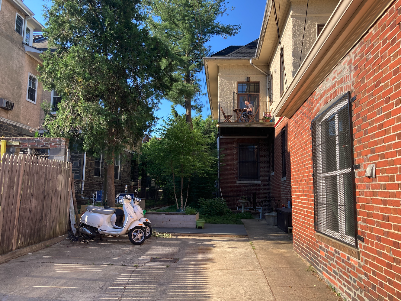 Two white scooters.  Envy!